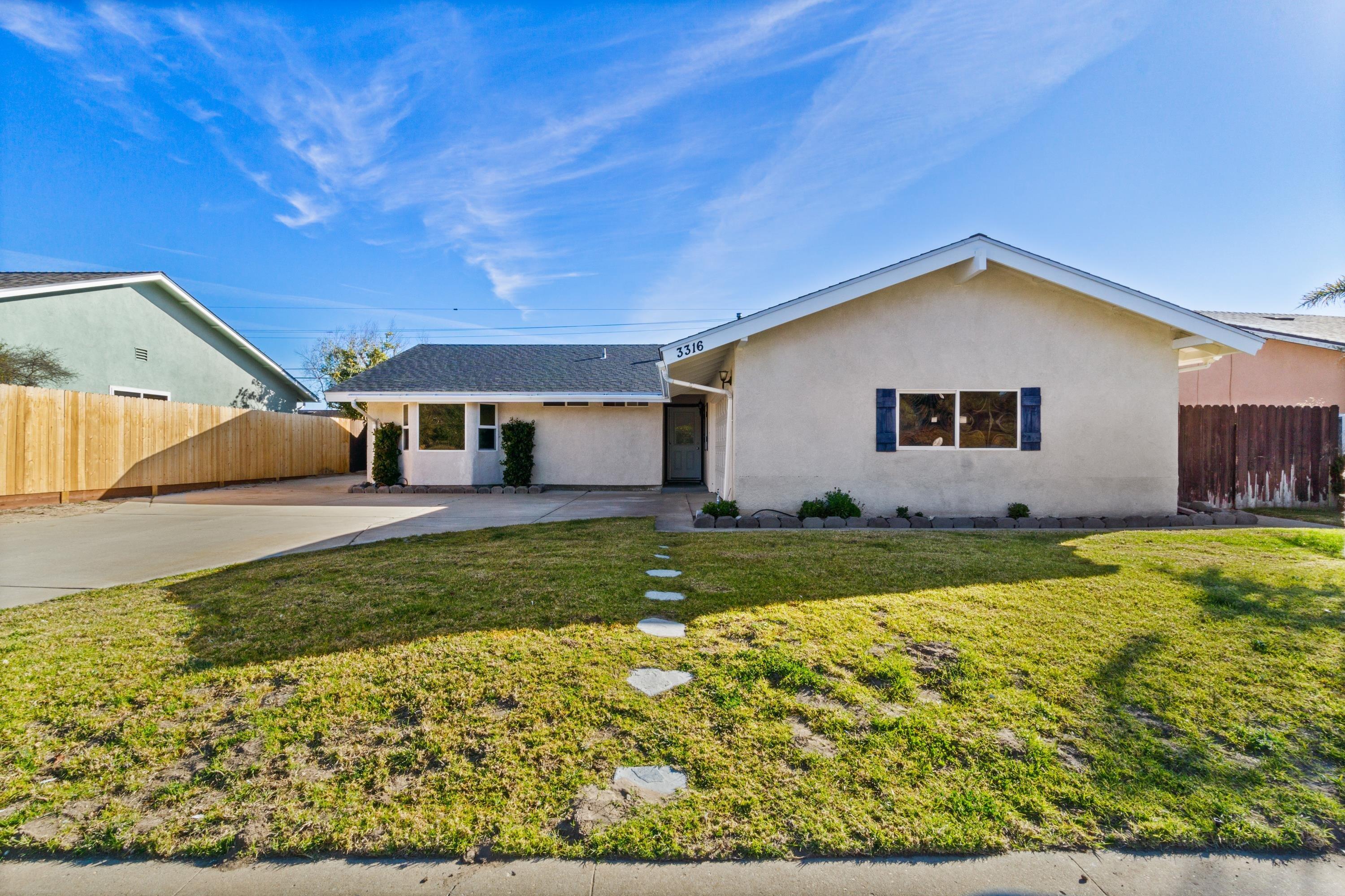 3316 Rucker Road Lompoc, CA 93436 - Photo 2 of 24 a front view of house with yard