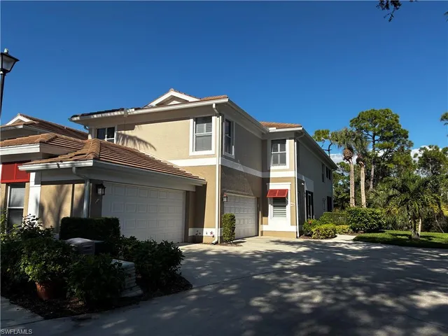 a view of a house with a street