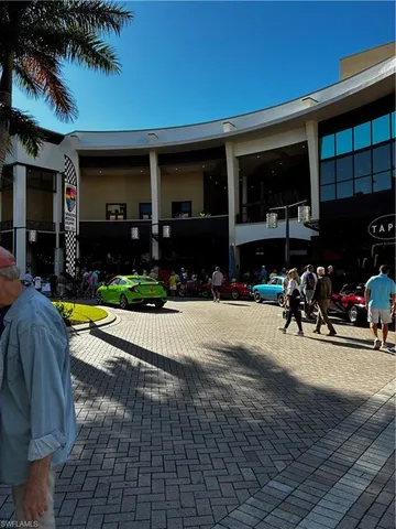 a view of street with sitting area