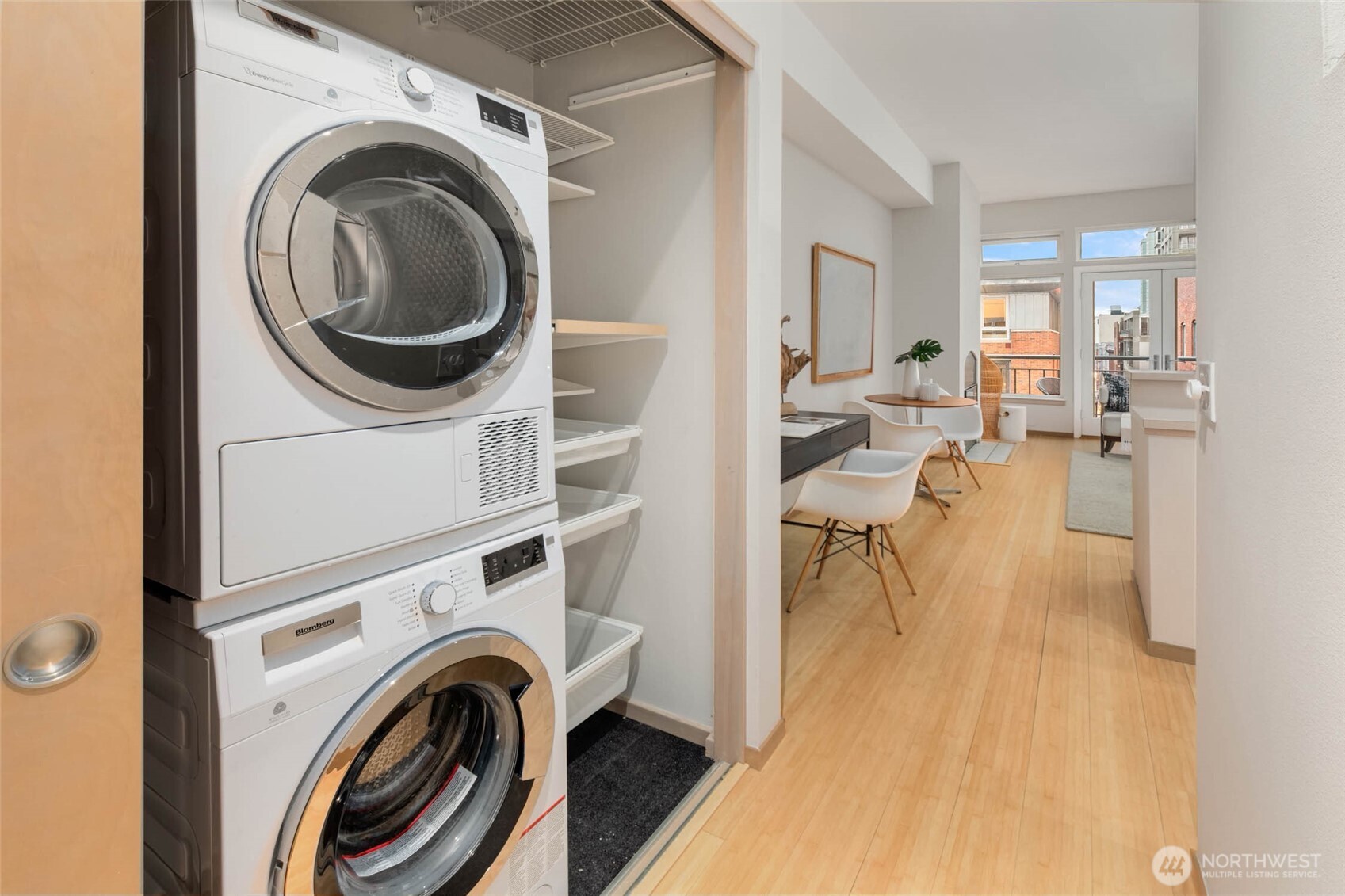 2030 Western Avenue, Unit 701 Seattle, WA 98121 - Photo 13 of 27 a view of a living room with washer and dryer