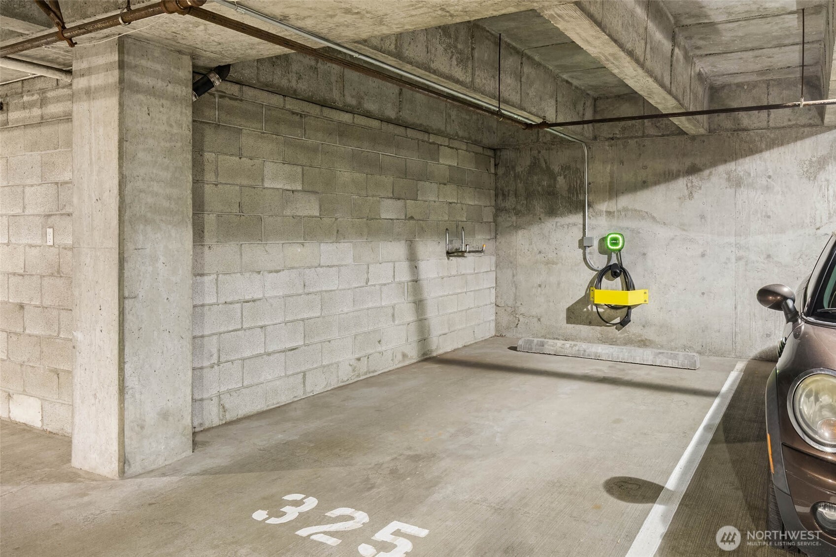 2030 Western Avenue, Unit 701 Seattle, WA 98121 - Photo 16 of 27 a bathroom with a sink and a shower