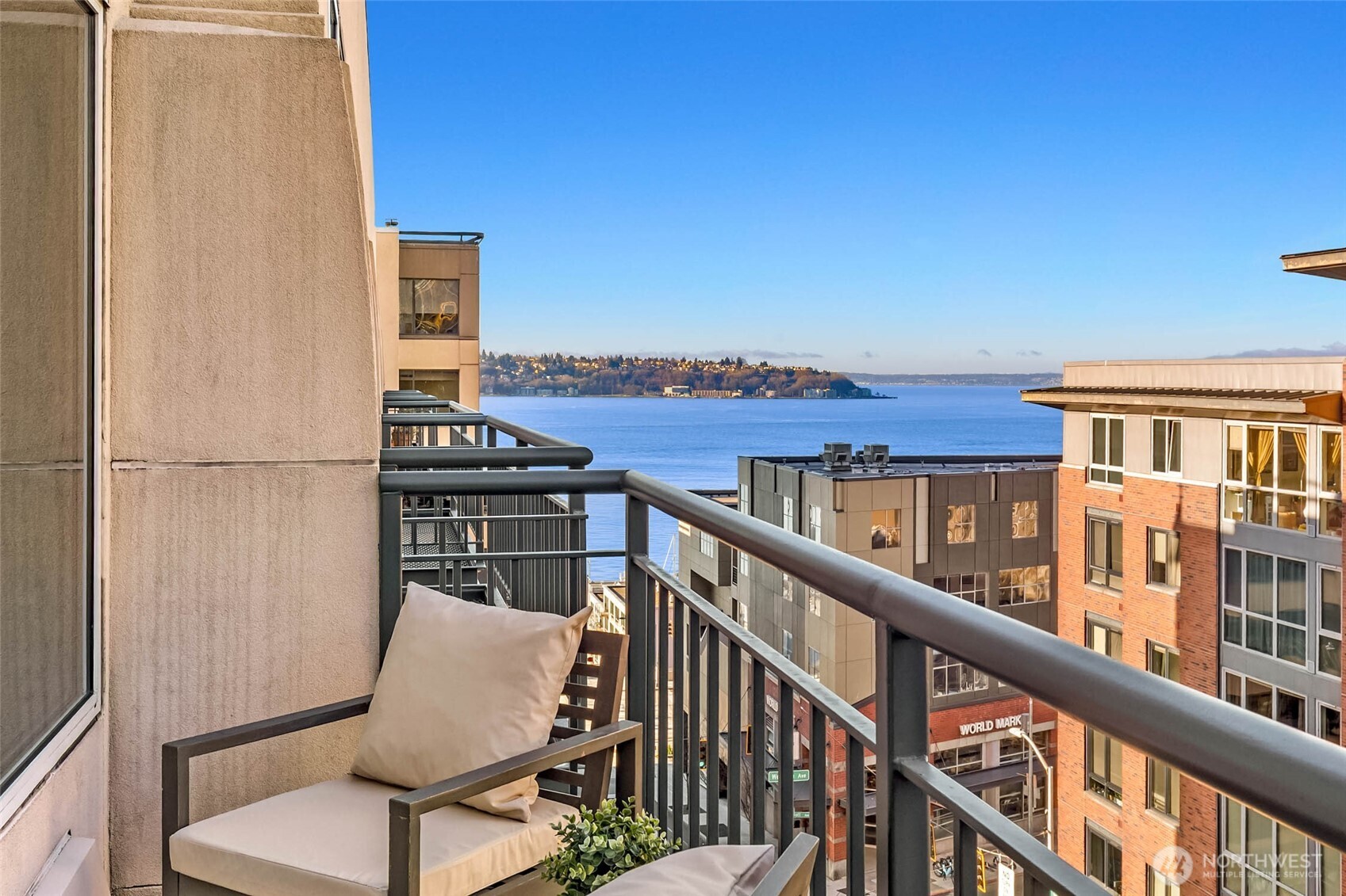 2030 Western Avenue, Unit 701 Seattle, WA 98121 - Photo 4 of 27 a view of a balcony with two chairs and a table