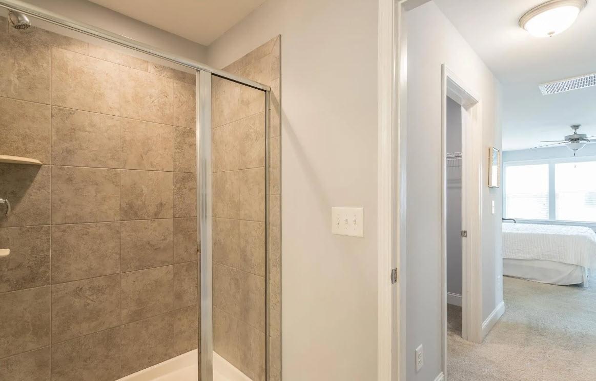 114 Willow View Lane Apex, NC 27539 - Photo 24 of 34 a bathroom with a shower and a sink