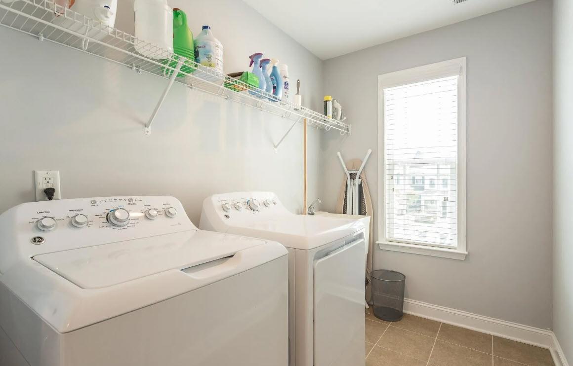 114 Willow View Lane Apex, NC 27539 - Photo 26 of 34 a utility room with dryer and washer