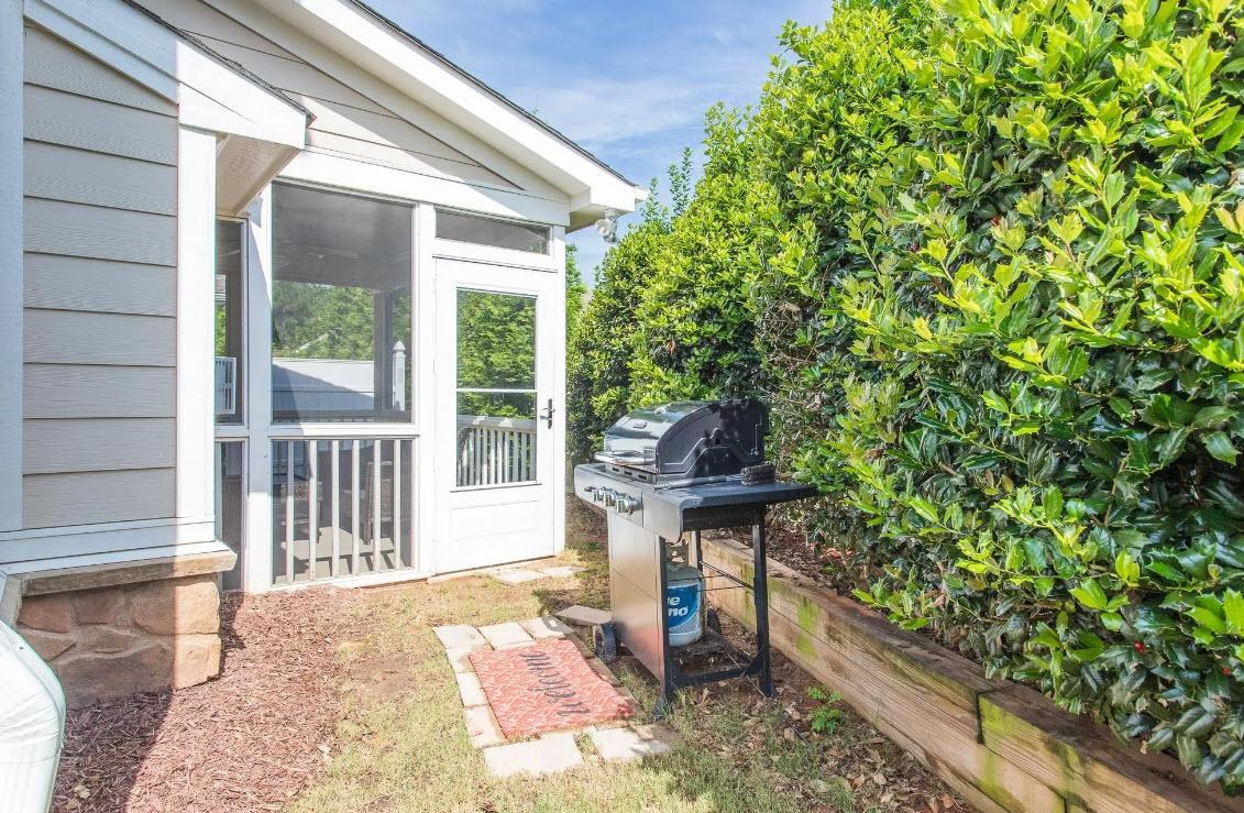 114 Willow View Lane Apex, NC 27539 - Photo 28 of 34 a house view with a garden space