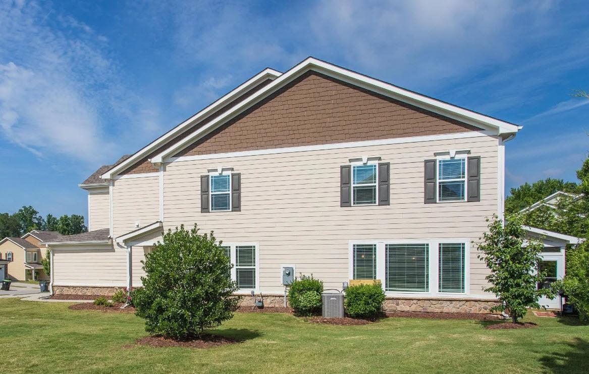 114 Willow View Lane Apex, NC 27539 - Photo 31 of 34 a front view of a house with a yard and garage