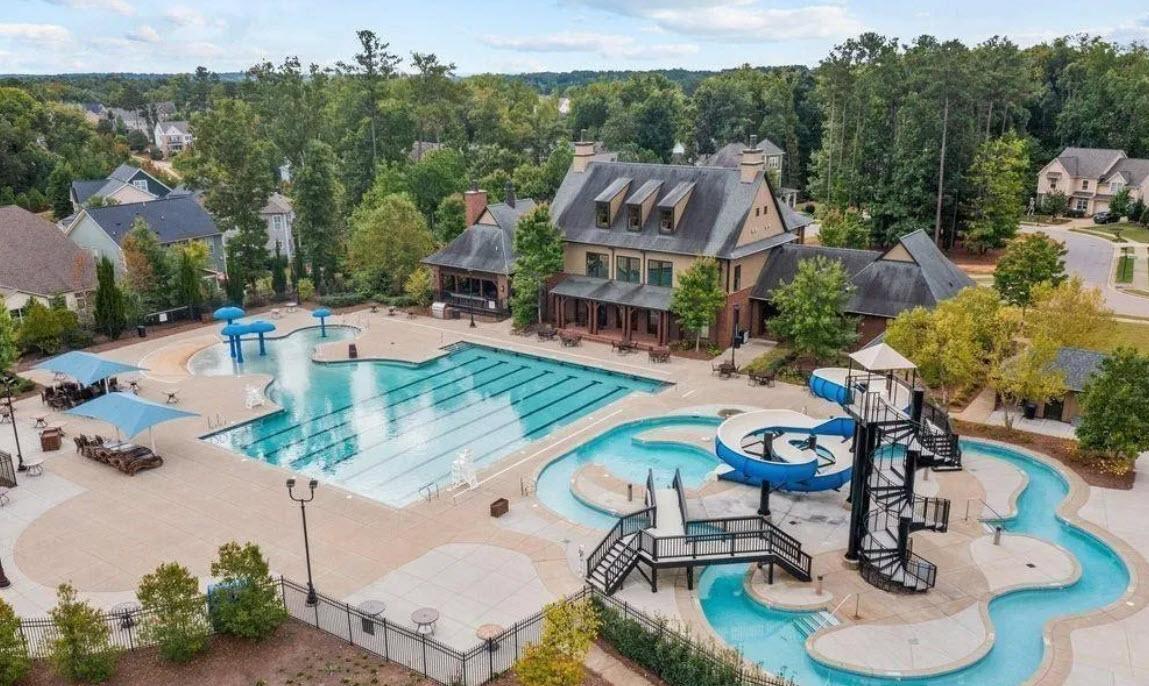 114 Willow View Lane Apex, NC 27539 - Photo 33 of 34 an aerial view of a house with garden space and swimming pool