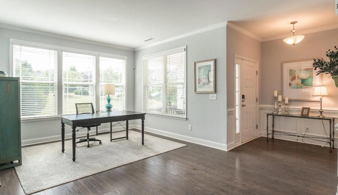 114 Willow View Lane Apex, NC 27539 - Photo 5 of 34 a view of a workspace with furniture and a window