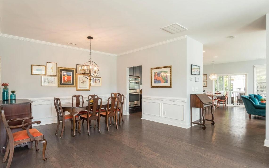 114 Willow View Lane Apex, NC 27539 - Photo 7 of 34 a view of a dining room with furniture and wooden floor