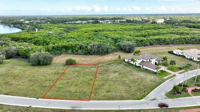a view of a terrace with yard and ocean view