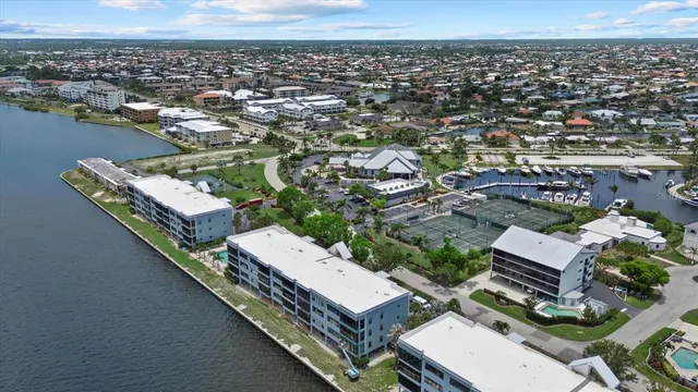 a view of multiple houses with outdoor space