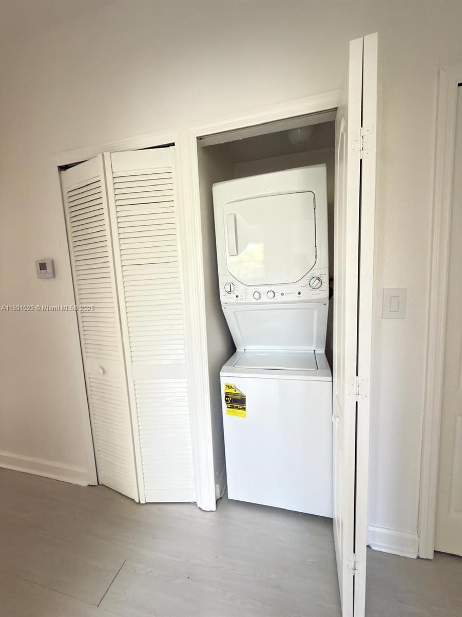 2903 Southeast 17th Avenue, Unit 206 Homestead, FL 33035 - Photo 23 of 28 a utility room with dryer and washer
