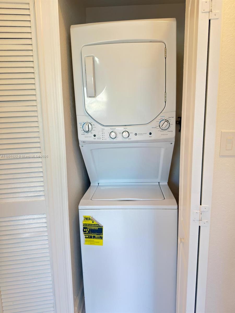 2903 Southeast 17th Avenue, Unit 206 Homestead, FL 33035 - Photo 24 of 28 a utility room with dryer and washer
