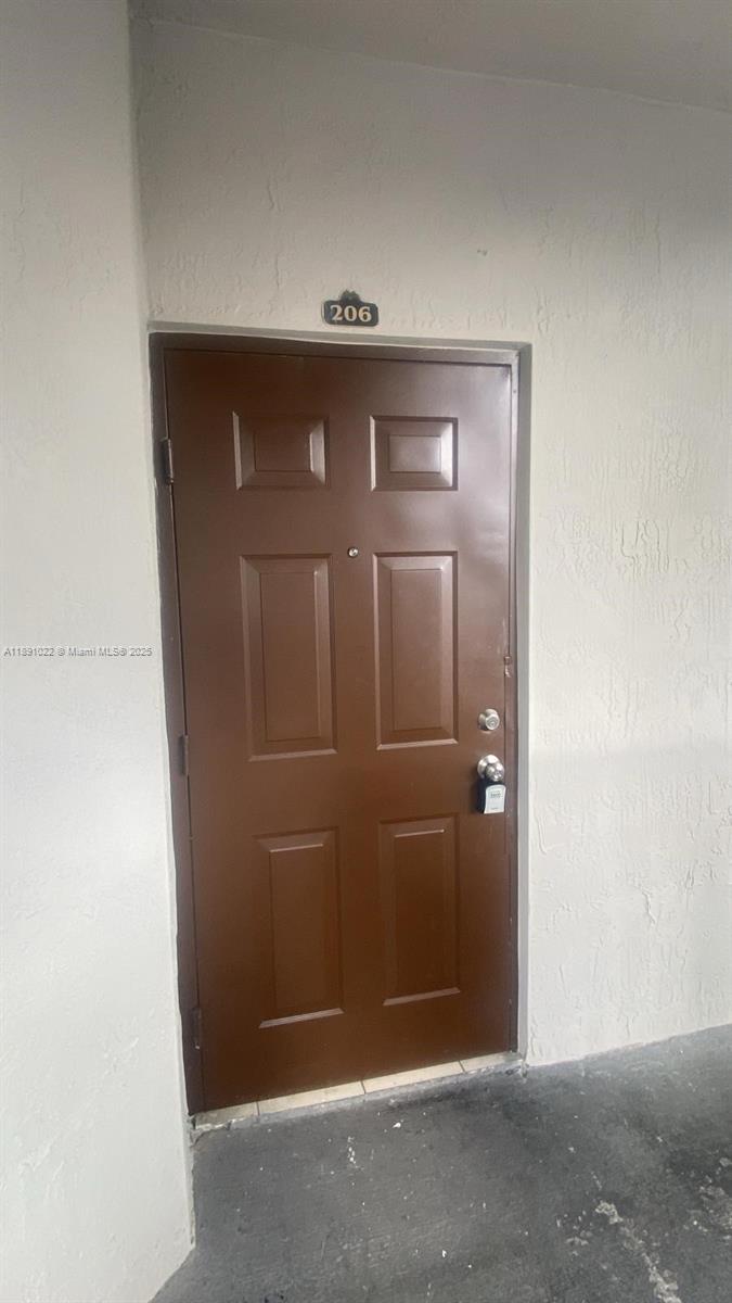 2903 Southeast 17th Avenue, Unit 206 Homestead, FL 33035 - Photo 25 of 28 a close view of cupboard