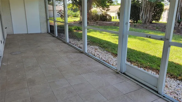 a view of a yard with tree s