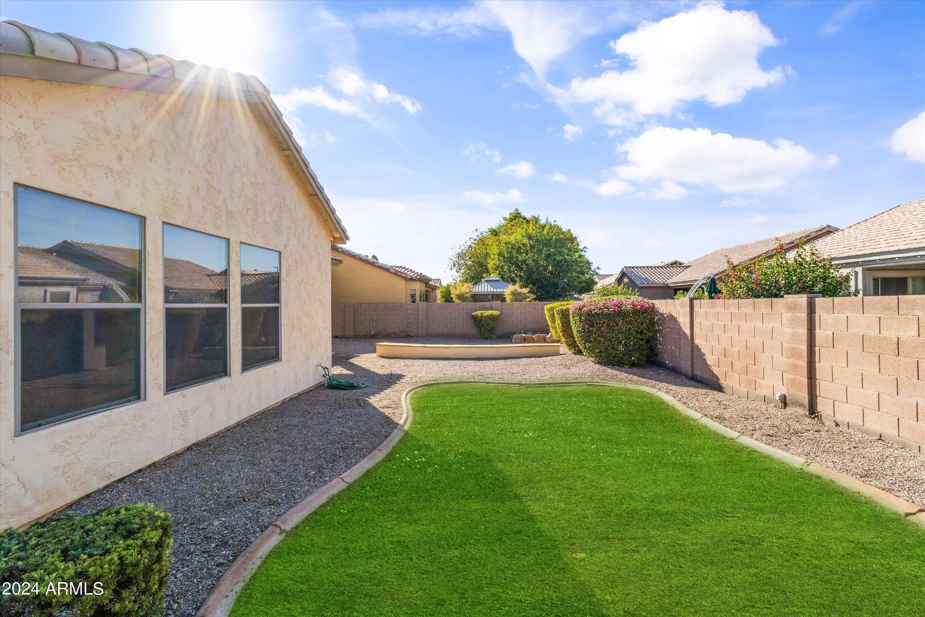 2860 East Nunneley Road Gilbert, AZ 85296 - Photo 26 of 28 a view of a backyard with sitting area