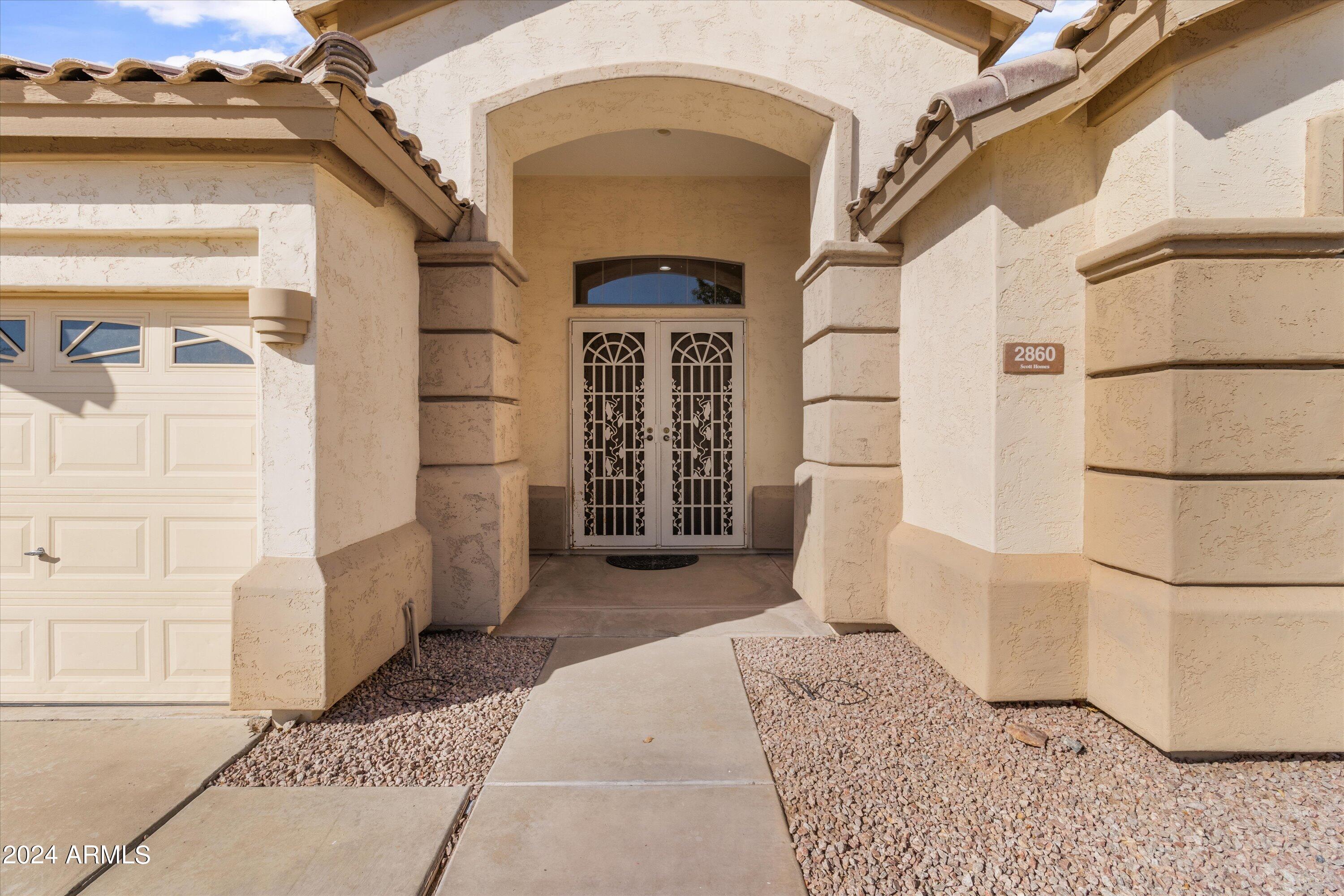 2860 East Nunneley Road Gilbert, AZ 85296 - Photo 5 of 28 a view of entryway with a front door