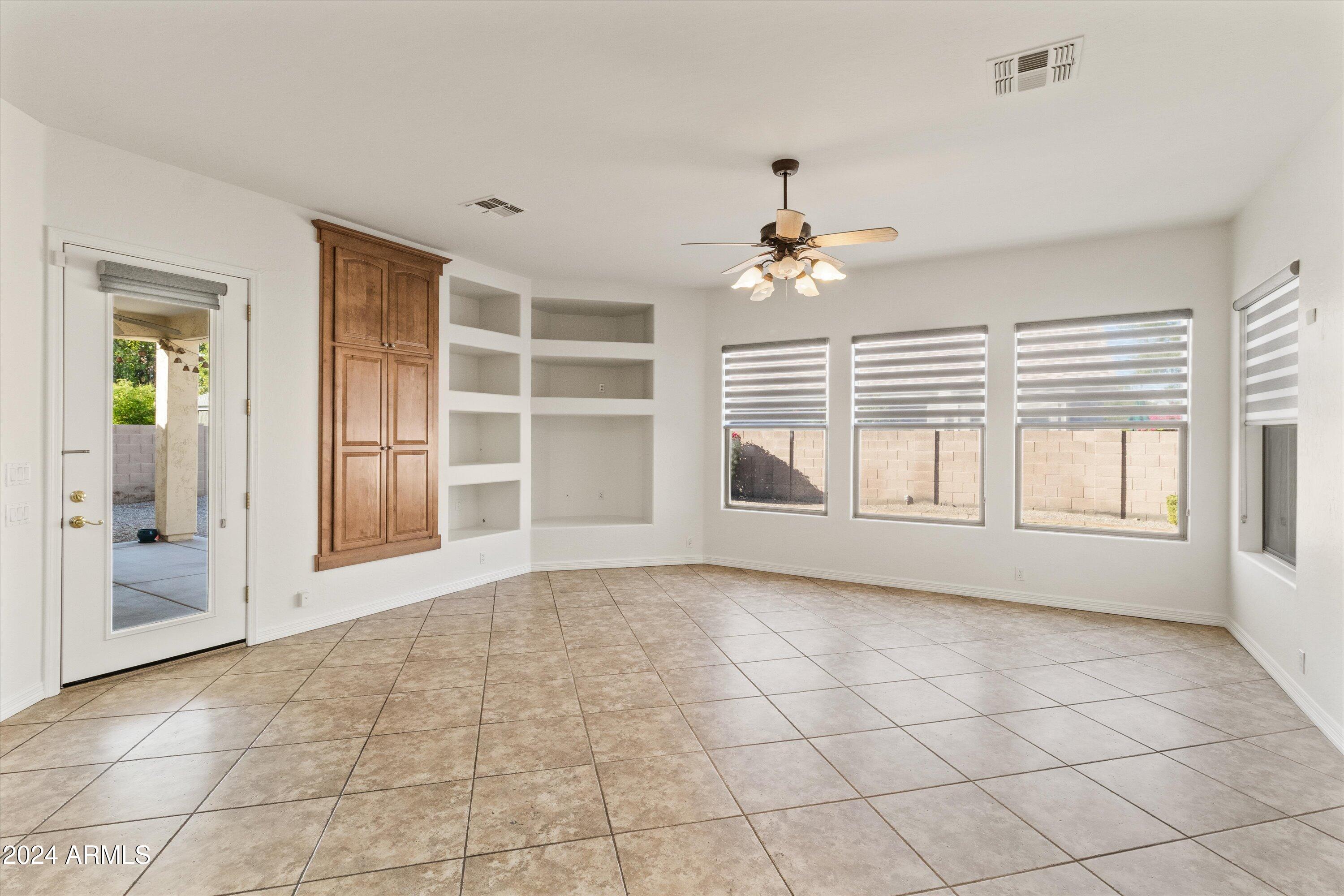 2860 East Nunneley Road Gilbert, AZ 85296 - Photo 7 of 28 a view of an empty room with a window