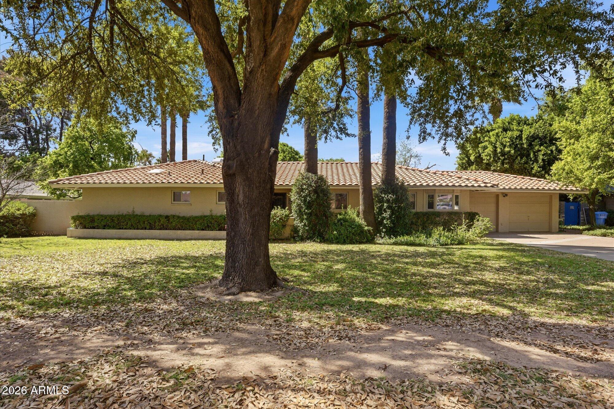8324 North 8th Avenue Phoenix, AZ 85021 - Photo 1 of 39 a view of a house with a yard