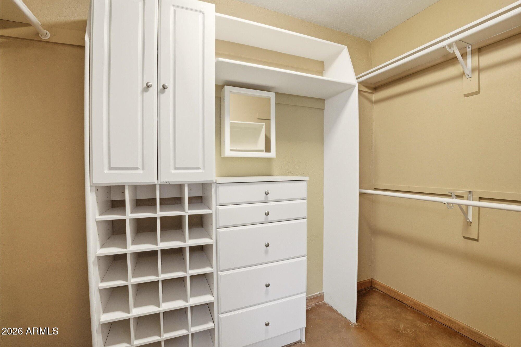 8324 North 8th Avenue Phoenix, AZ 85021 - Photo 15 of 39 a view of walk in closet with empty racks