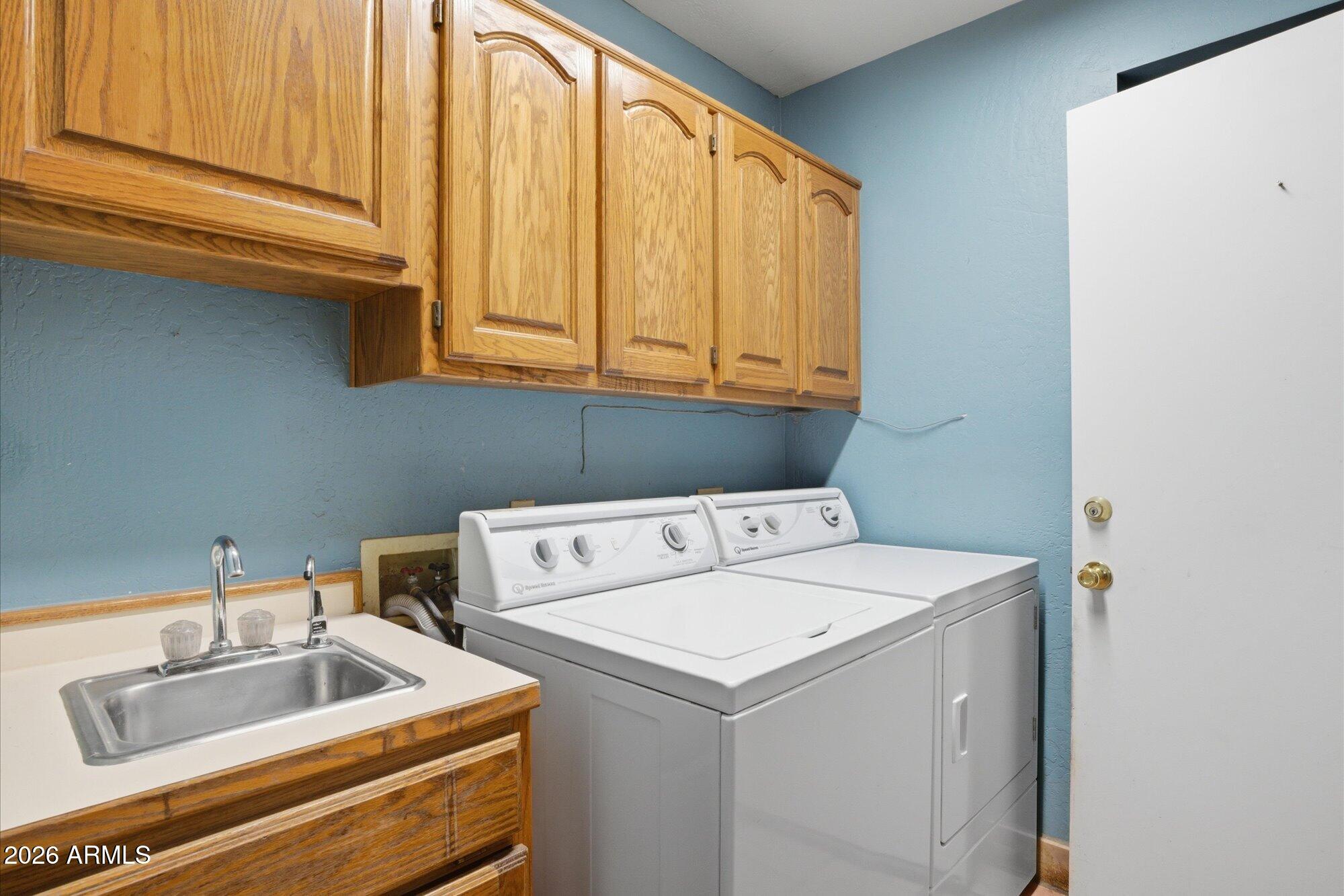 8324 North 8th Avenue Phoenix, AZ 85021 - Photo 19 of 39 a utility room with dryer and washer