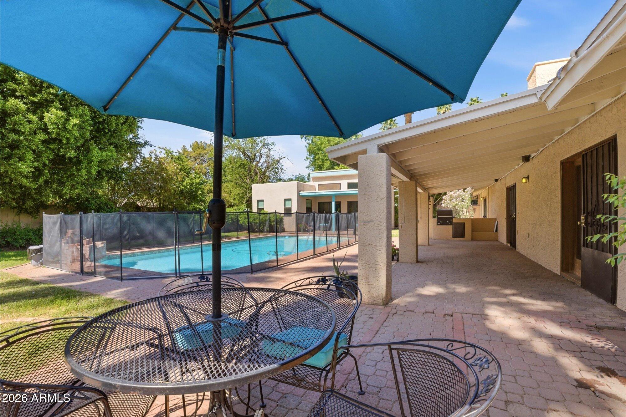 8324 North 8th Avenue Phoenix, AZ 85021 - Photo 28 of 39 a view of a swimming pool with a patio