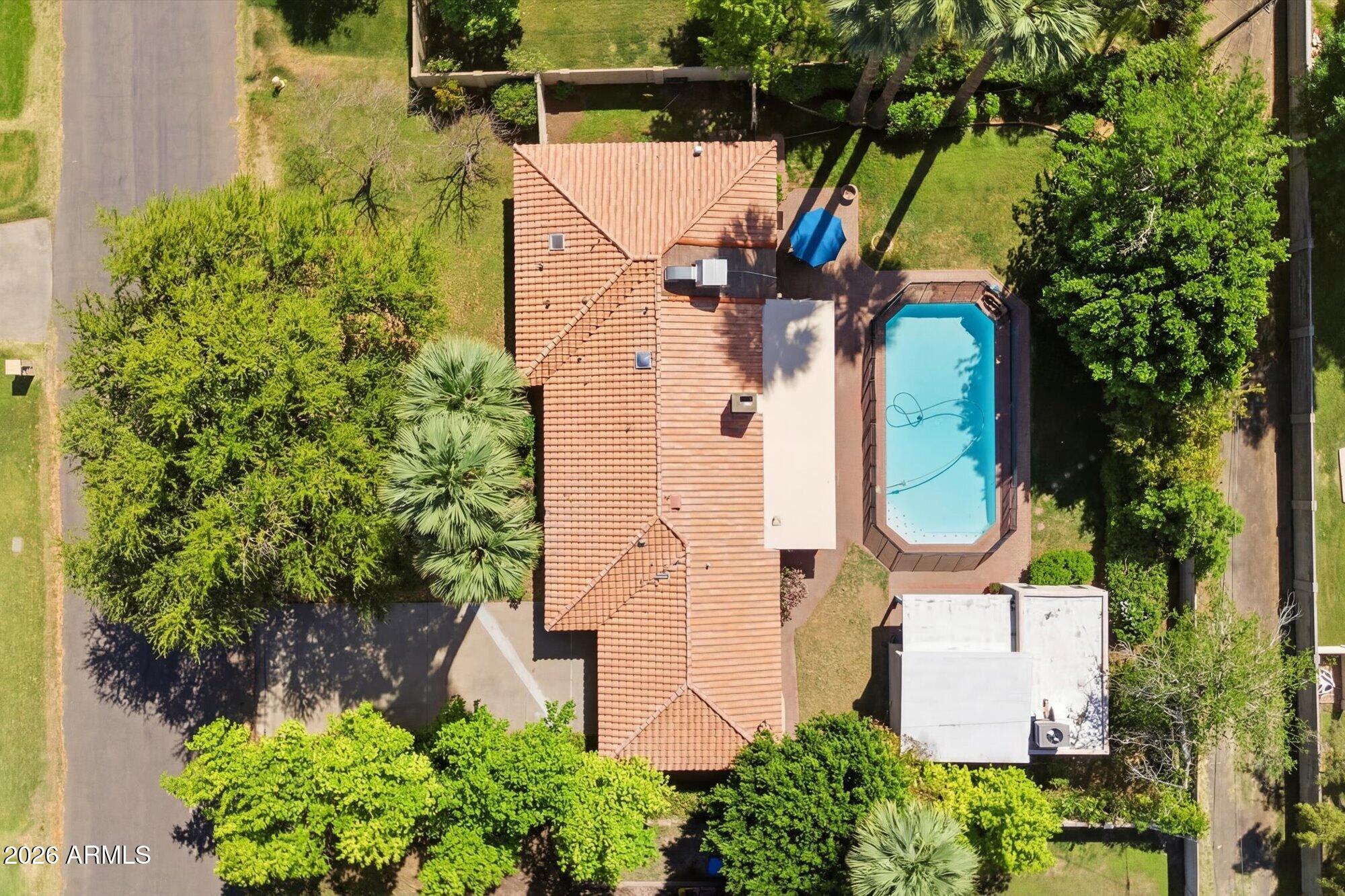 8324 North 8th Avenue Phoenix, AZ 85021 - Photo 33 of 39 an aerial view of a house with a yard swimming pool and outdoor seating