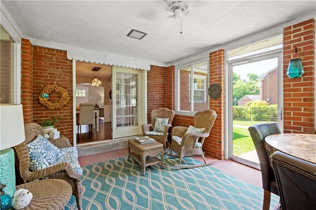 1376 Morrow Road Pittsburgh, PA 15241 - Photo 11 of 25 a living room with furniture and a floor to ceiling window