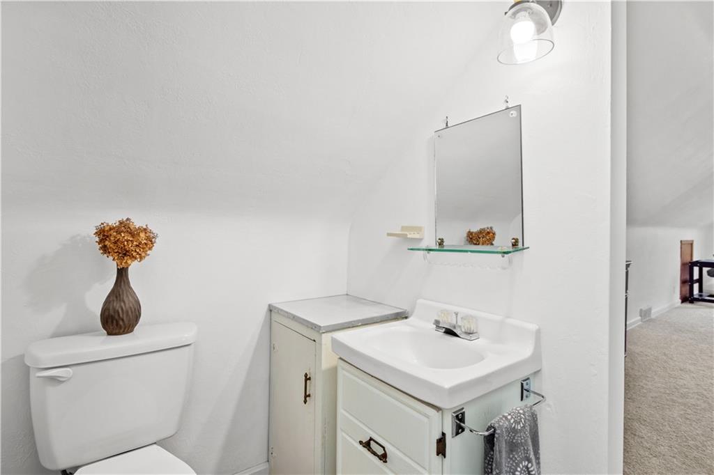 1376 Morrow Road Pittsburgh, PA 15241 - Photo 18 of 25 a bathroom with a sink and a mirror
