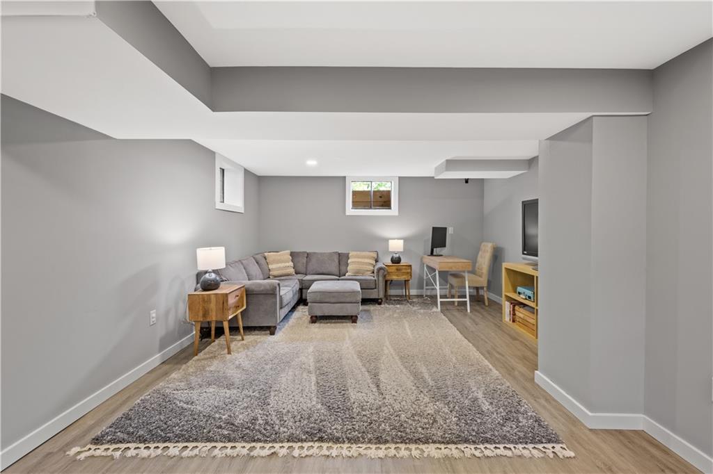1376 Morrow Road Pittsburgh, PA 15241 - Photo 19 of 25 a living room with furniture lamp and a rug