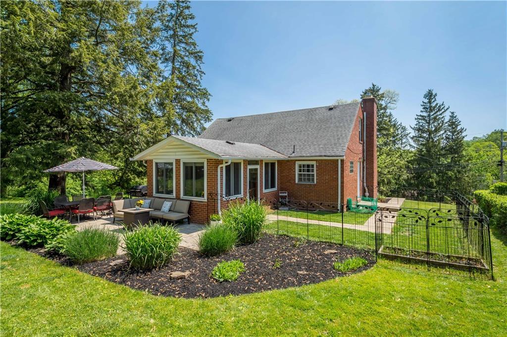 1376 Morrow Road Pittsburgh, PA 15241 - Photo 22 of 25 a front view of a house with garden