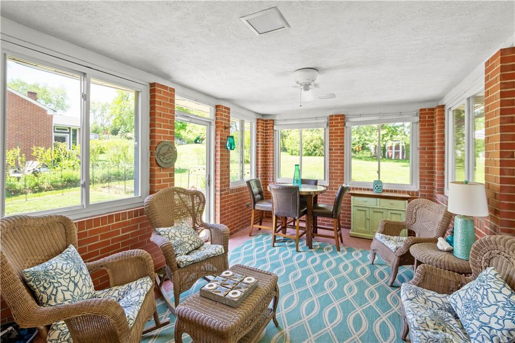 1376 Morrow Road Pittsburgh, PA 15241 - Photo 10 of 25 a living room with furniture and large windows