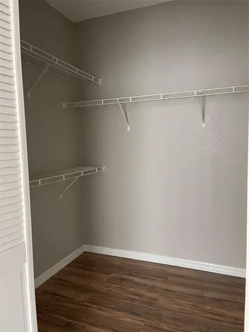 a kitchen with a cabinets and fireplace