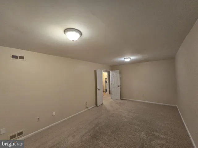 a view of a balcony with a pot