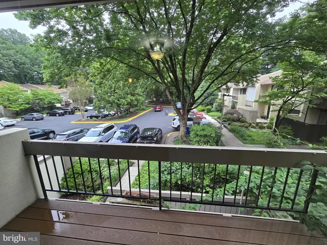 a view of a small yard from a balcony