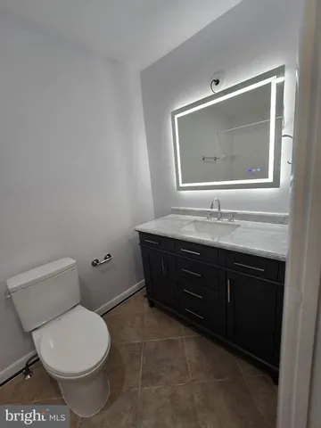 a view of an empty room with windows