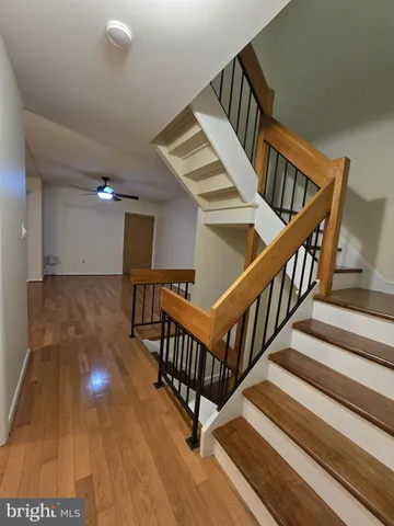 a view of entryway with wooden floor
