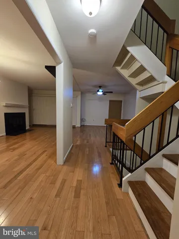 a view of entryway with wooden floor