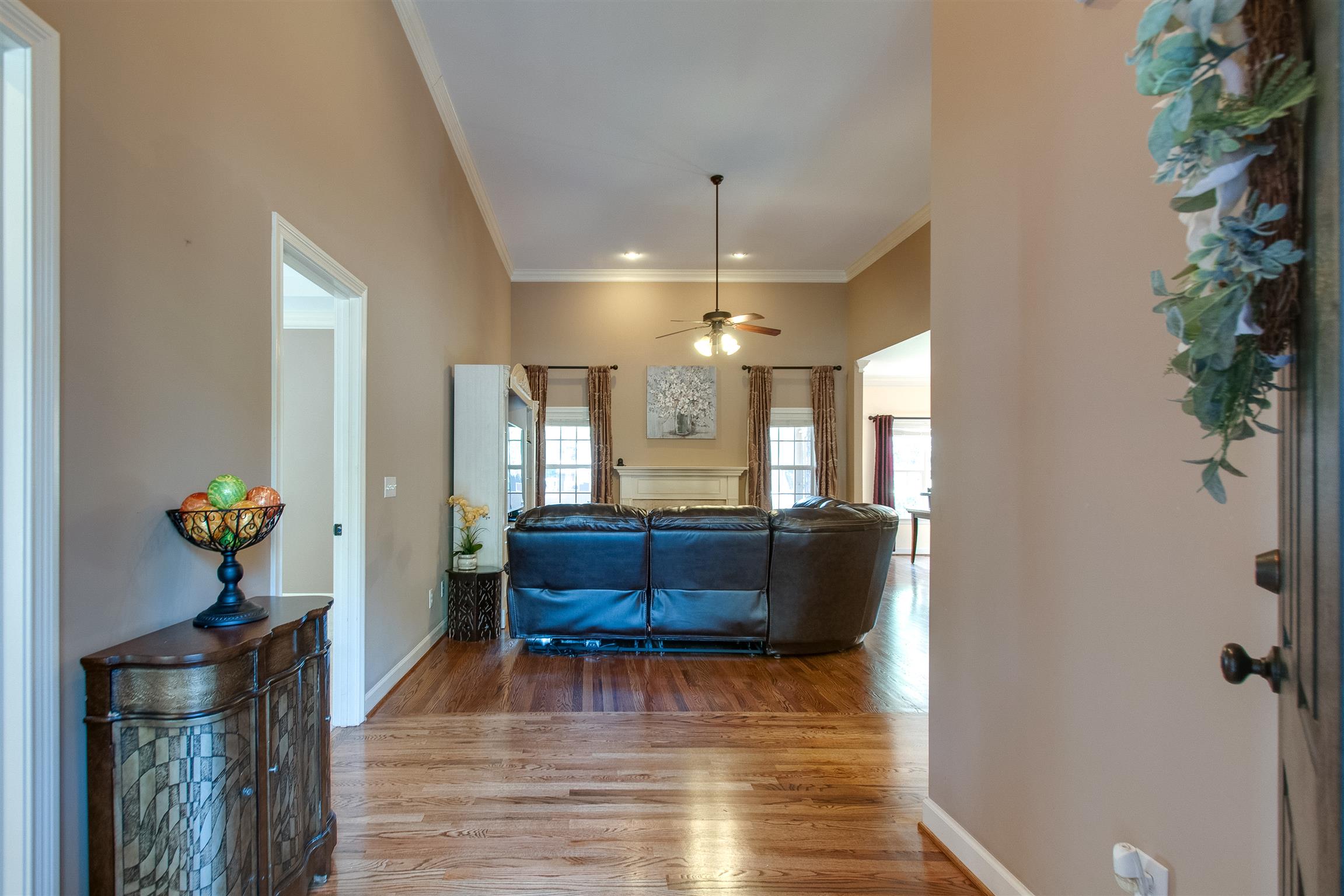211 Bellevue Road Nashville, TN 37221 - Photo 4 of 30 High ceilings in living room with gas fireplace.