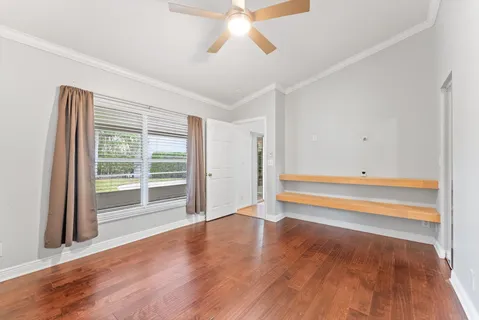 a bathroom with a double vanity sink and mirror with shower