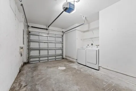 a patio with table and chairs