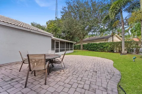 a view of a park with plants and trees