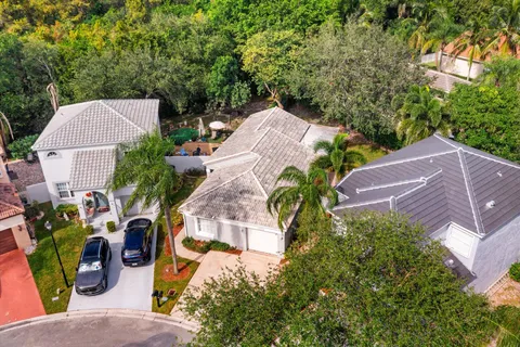 an aerial view of a house with outdoor space
