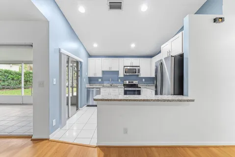 a view of a room with porch and windows