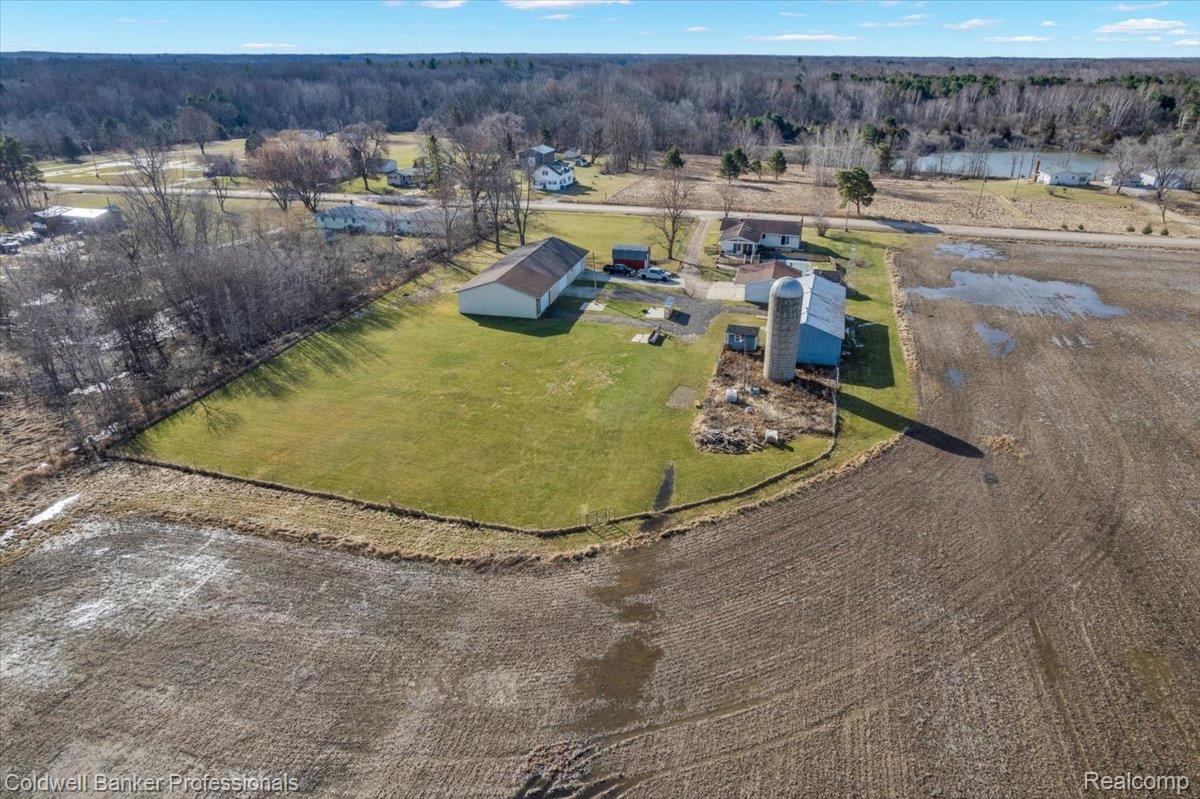 7410 Wilson Road Montrose, MI 48457 - Photo 7 of 38 Bird's eye view of a heavily wooded area