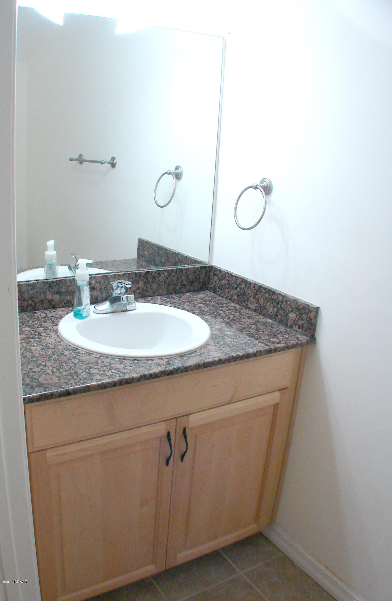 542 Northwest 39th Road, Unit 402 Gainesville, FL 32607 - Photo 10 of 13 542-half bath1