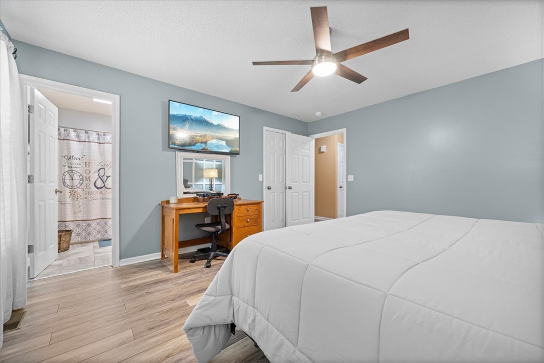623 New Hope Road Anderson, SC 29626 - Photo 18 of 49 Smooth wood-look flooring and clean lines define this comfortable sleeping space.