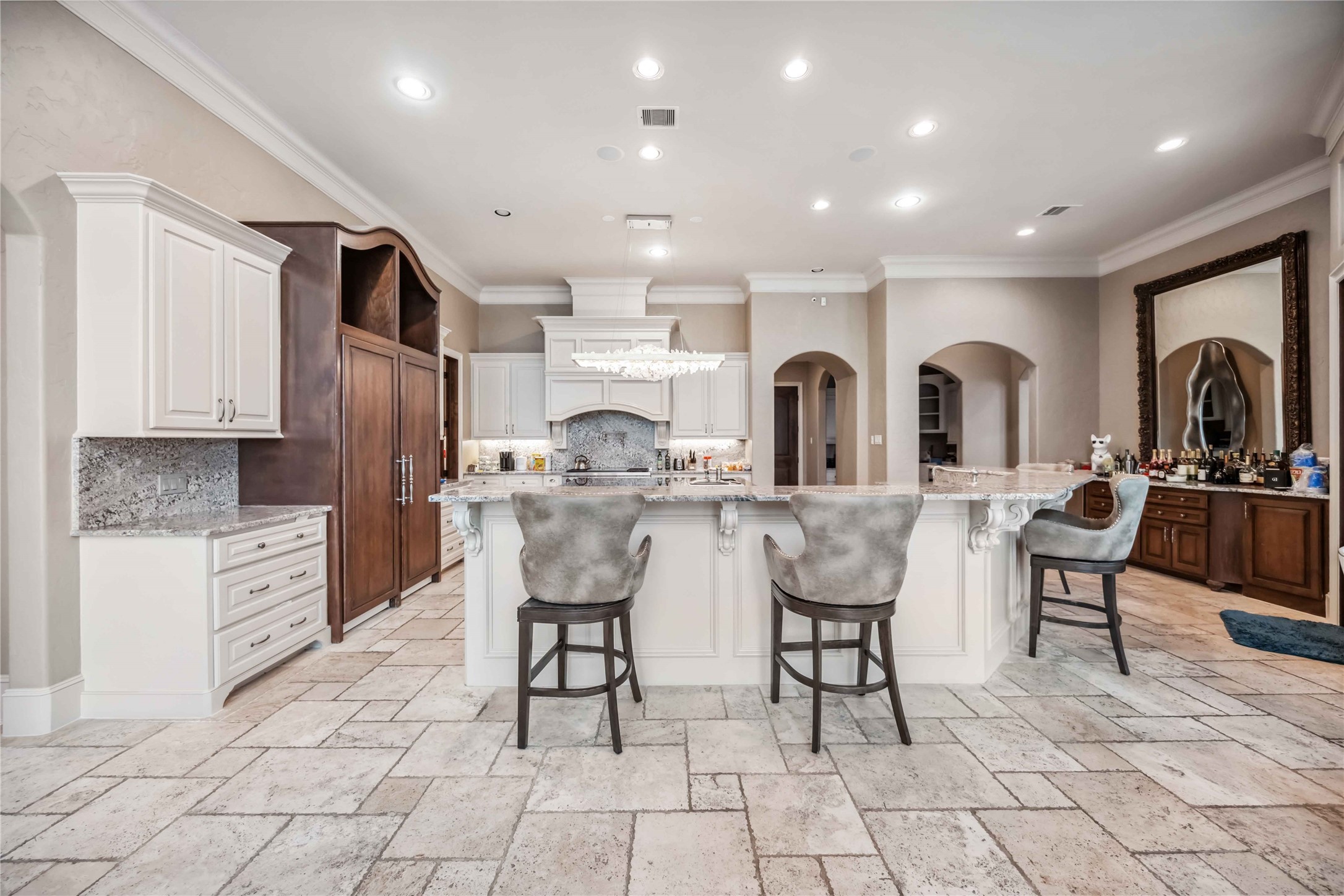 4510 Siandra Creek Court Spring, TX 77386 - Photo 14 of 50 a open kitchen with stainless steel appliances kitchen island granite countertop a table and chairs in it