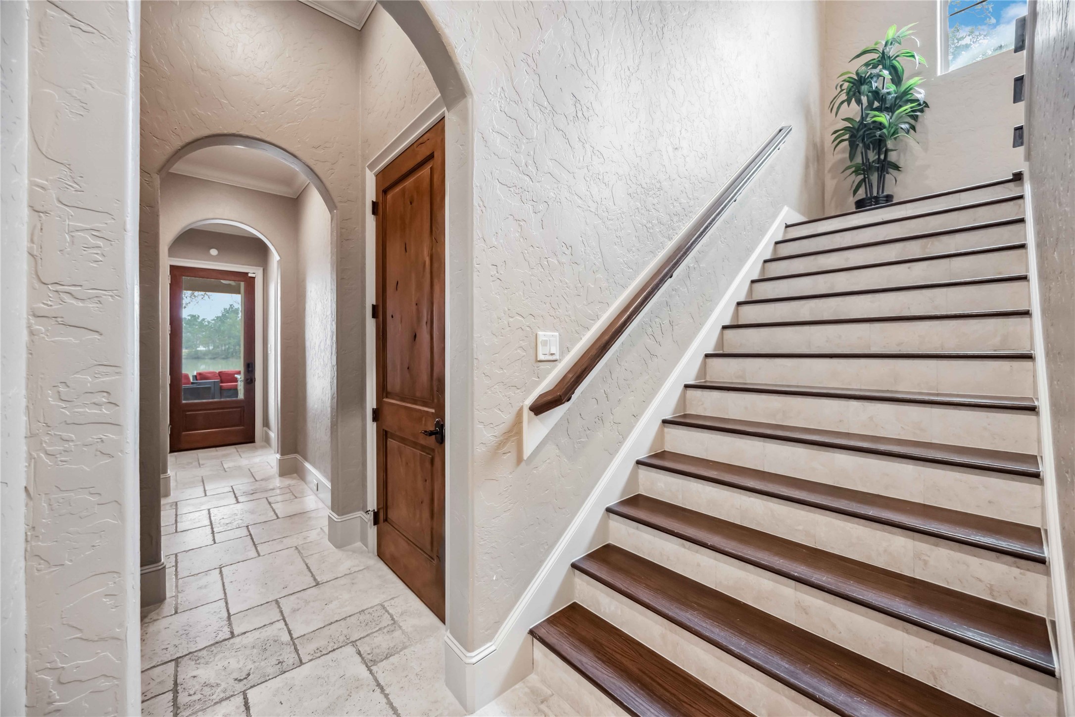 4510 Siandra Creek Court Spring, TX 77386 - Photo 20 of 50 a view of a hallway with wooden floor and staircase