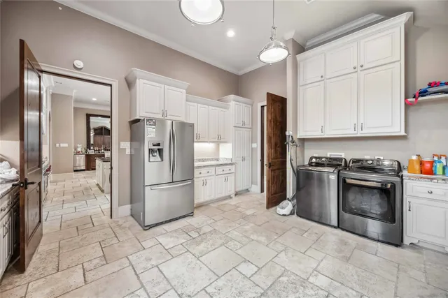 a bathroom with a granite countertop sink mirror and toilet